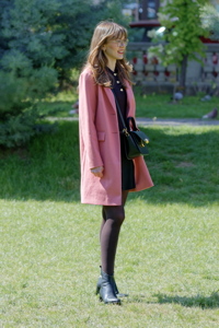 Nice young woman in a garden